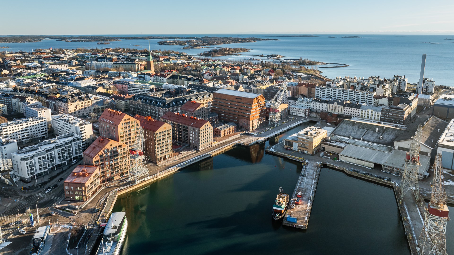 Telakkarannan rakennusten arkkitehtuurissa on kunnioitettu alueen teollista historiaa.